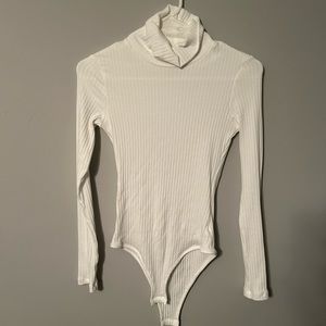 White turtle neck body suit